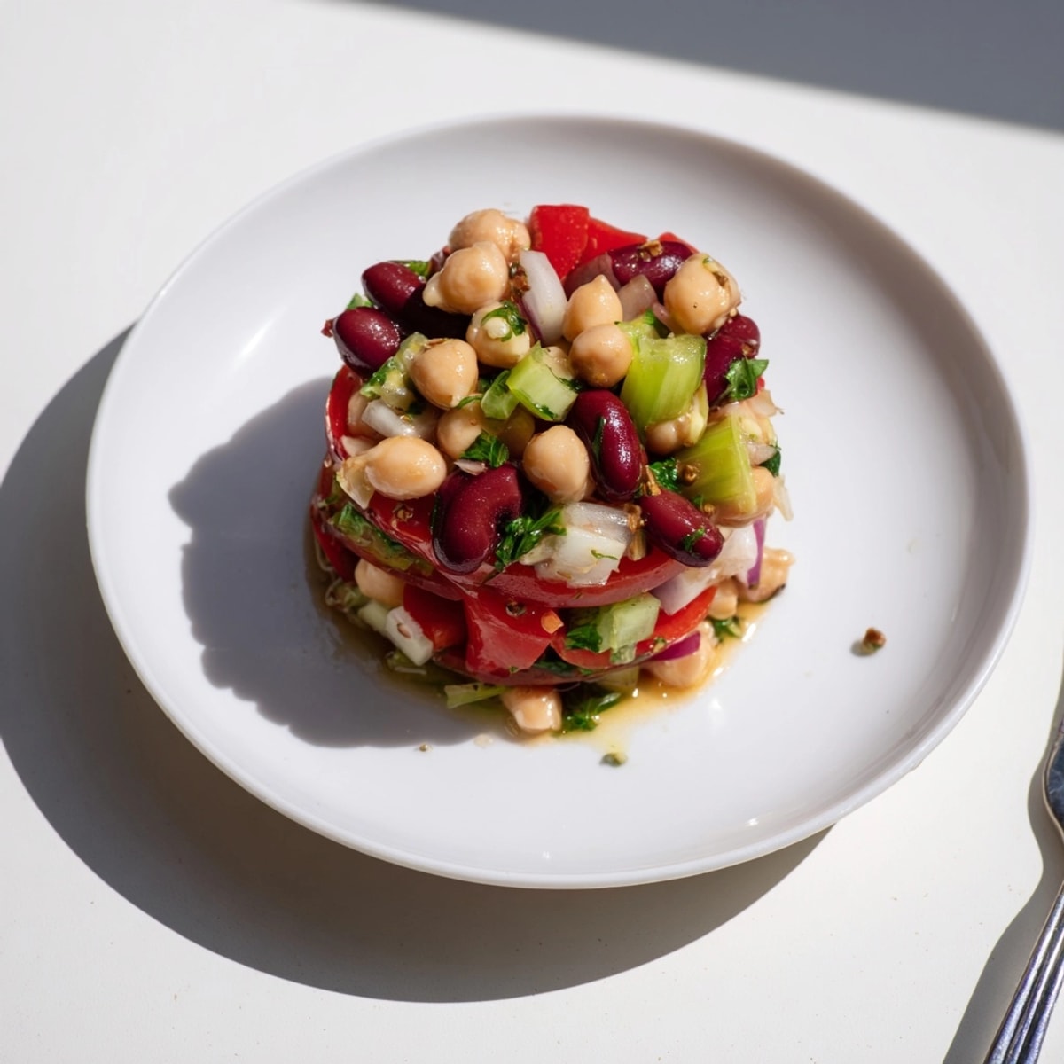 Hearty Marinated Dense Bean Salad, ready to serve as a flavorful, healthy side dish.