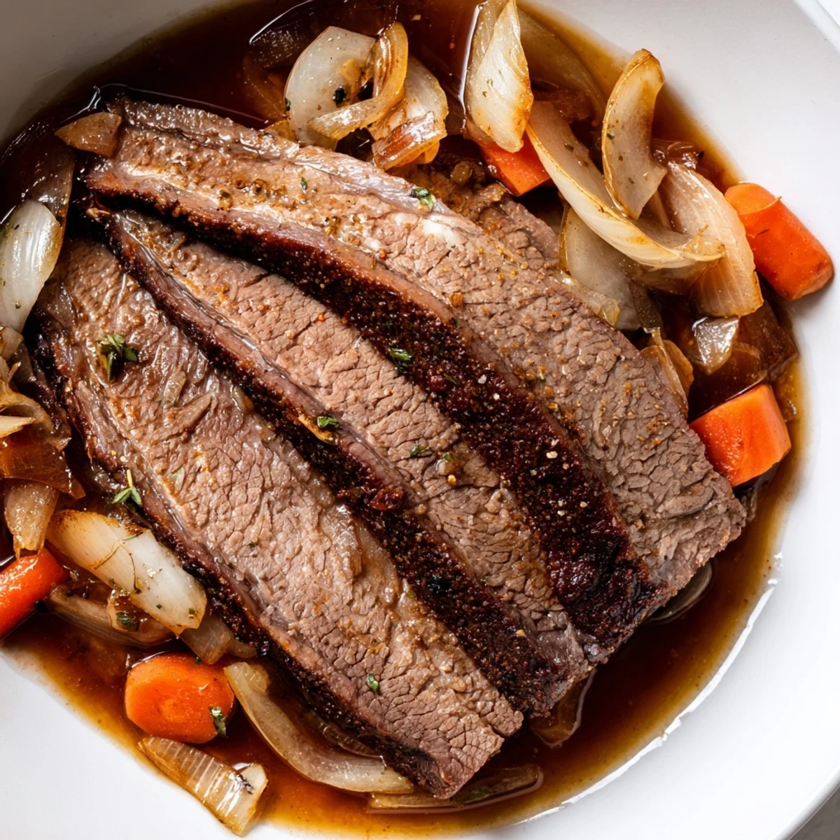 Juicy, tender beef brisket sliced and ready to serve, a classic American comfort food dinner.