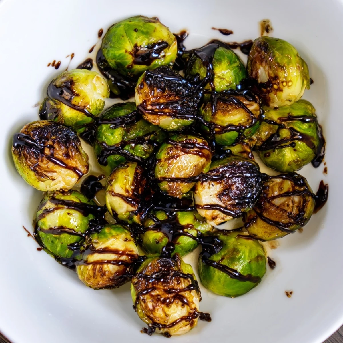 Crispy roasted Brussels sprouts with a sweet-tangy glaze, a perfect vegetarian side or holiday dish idea.