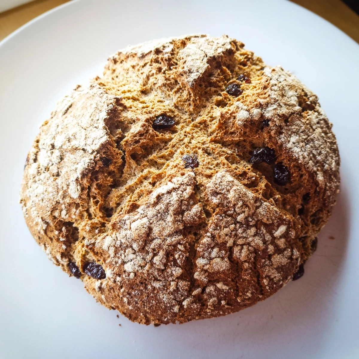 Freshly baked Whole Wheat Irish Soda Bread with Currants shows a soft, tender crumb.