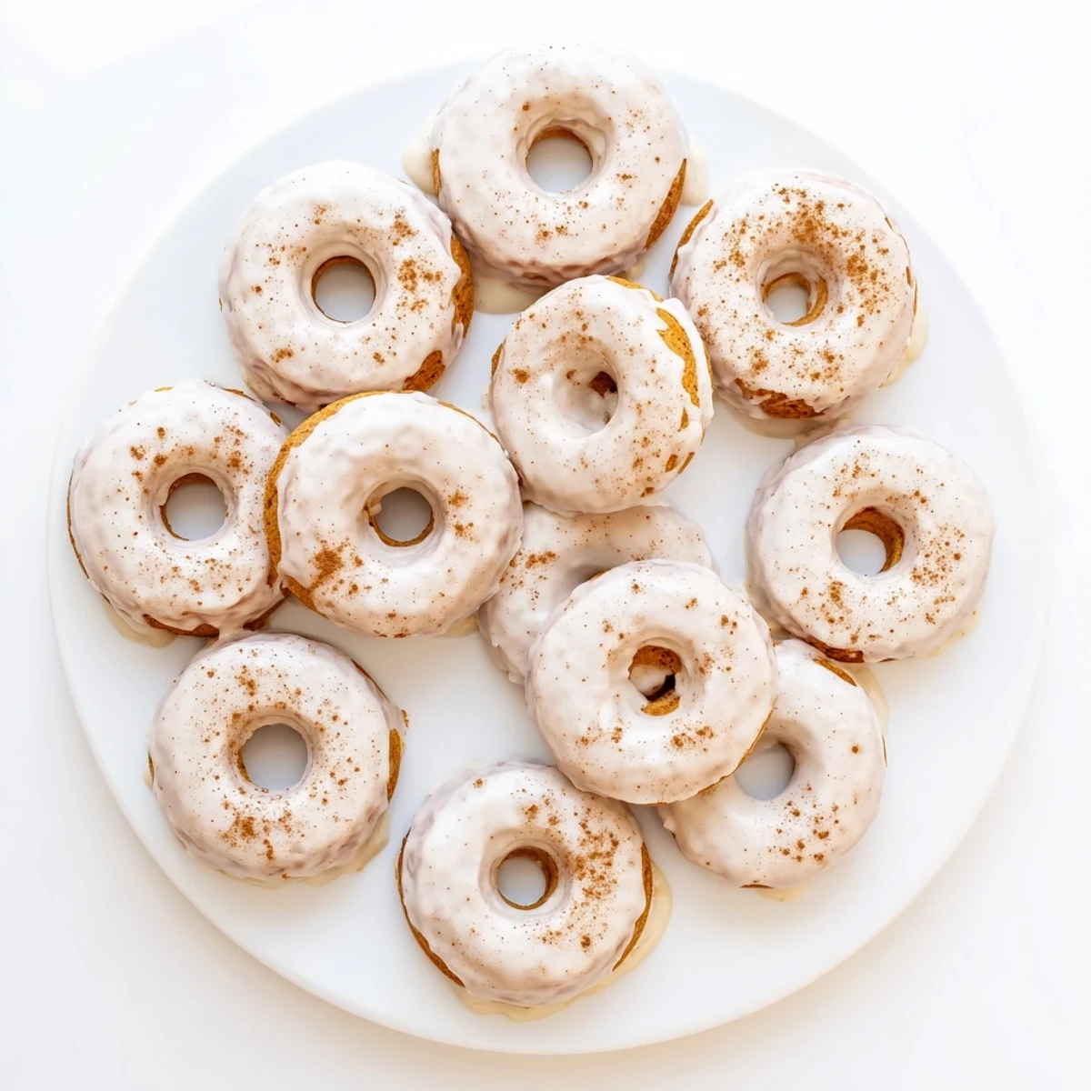 Light and fluffy Greek yogurt cake donuts arranged on a white serving platter